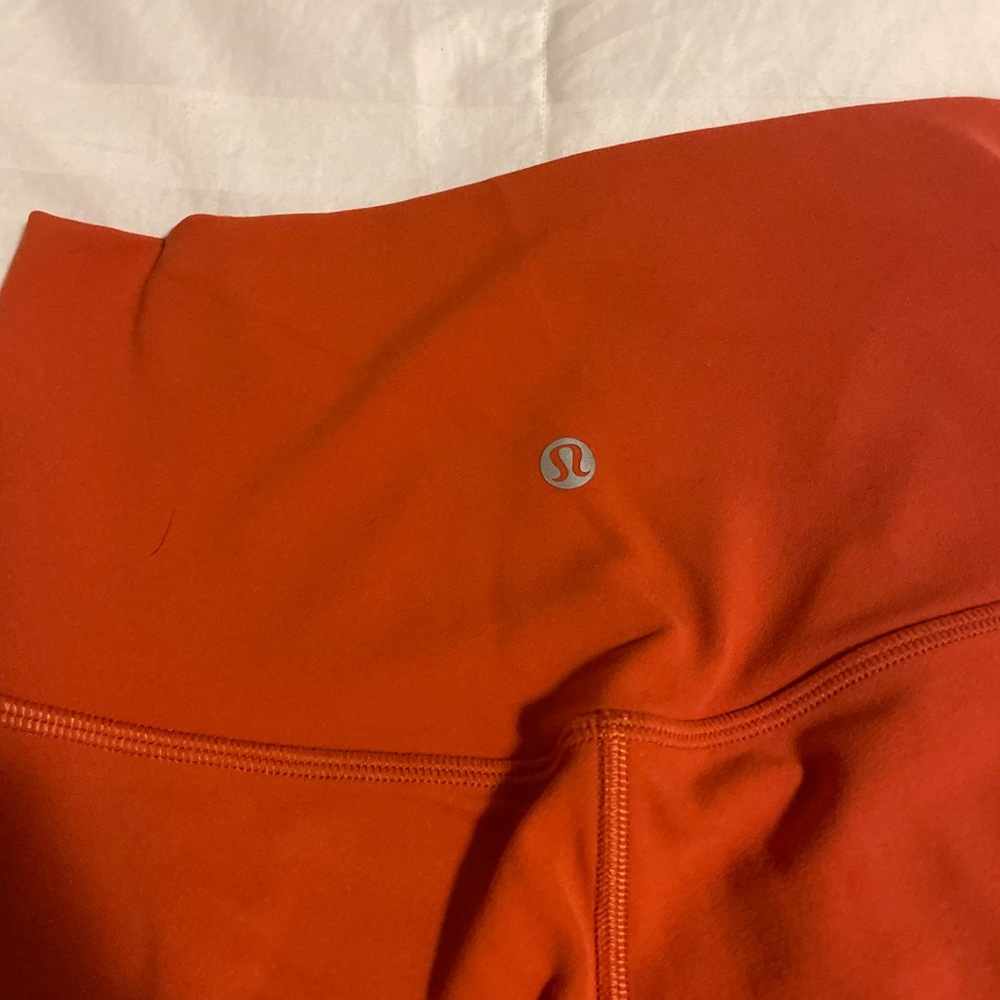 Lululemon leggings in Orange size 4 extra thick very warm only worn once